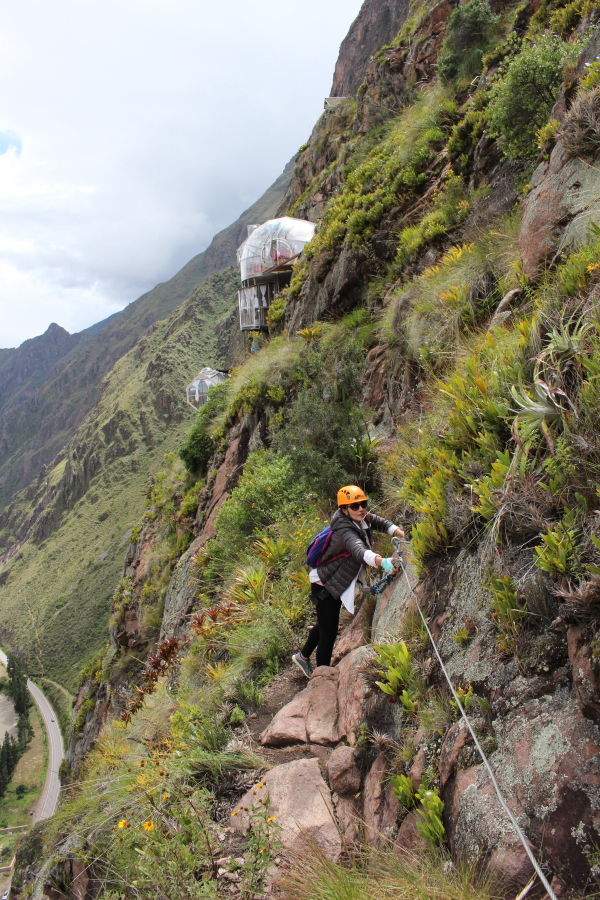 Skylodge Adventure Suites, Urubamba Valley, hanging pods, transparent accommodation, cliffside stay, thrilling experience, panoramic views, unique lodging, Peru, adventure travel, cliff suspension, unforgettable stay, elevated lodging, cliffside pods, mountain retreat, Urubamba River, extreme accommodation, mountainous landscape, Andes Mountains, Skylodge review