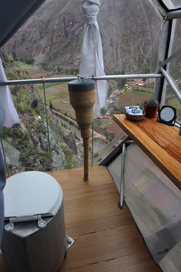 Skylodge Adventure Suites, Urubamba Valley, hanging pods, transparent accommodation, cliffside stay, thrilling experience, panoramic views, unique lodging, Peru, adventure travel, cliff suspension, unforgettable stay, elevated lodging, cliffside pods, mountain retreat, Urubamba River, extreme accommodation, mountainous landscape, Andes Mountains, Skylodge review